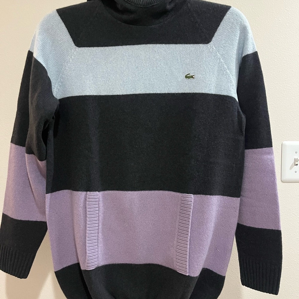Lacoste Blue Mauve and Grey Striped
Hooded Sweater
Size FR 42 /USA L